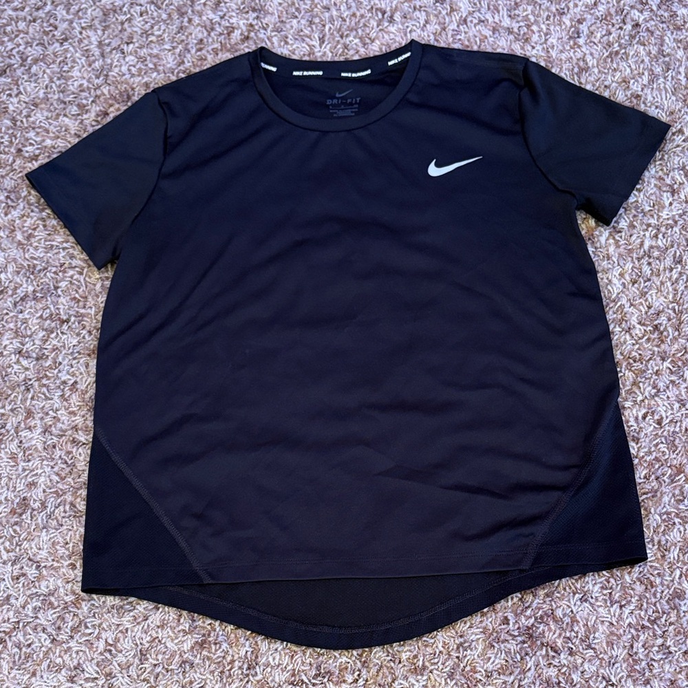 Nike women’s Black Short Sleeve Tee.